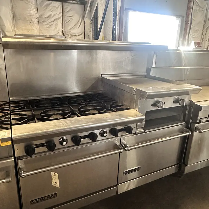 American range 6 Burner , Griddle , and two Ovens Natural Gas - Master